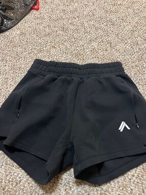 Alphalete Black Athletic Shorts with Logo Accent